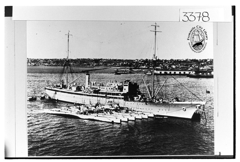 USS Holland with submarines