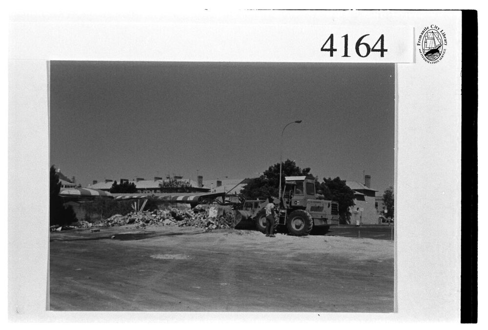 Clearing the rubble of the old turnstiles at Fremantle Oval