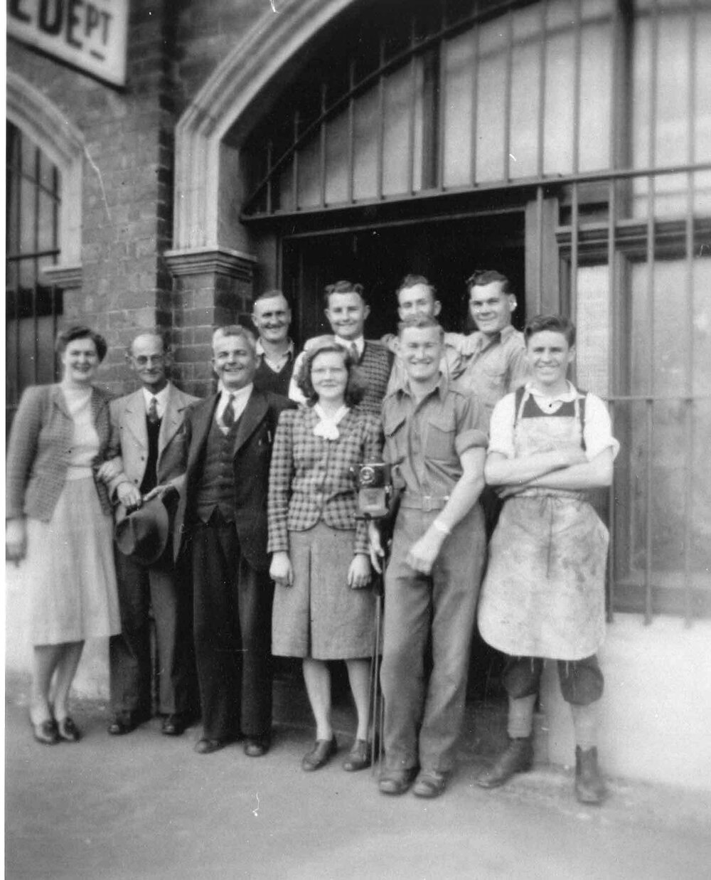 Staff standing outside the Bateman Building at 34 Mouat Street