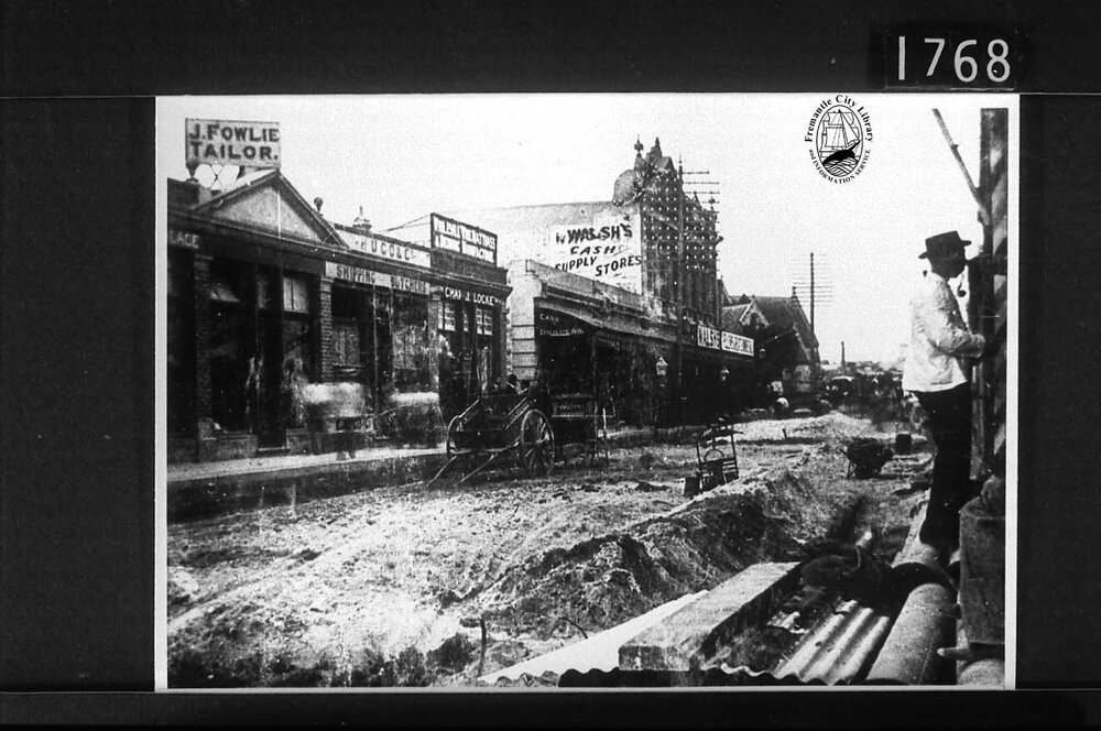 Laying wooden blocks in High Street