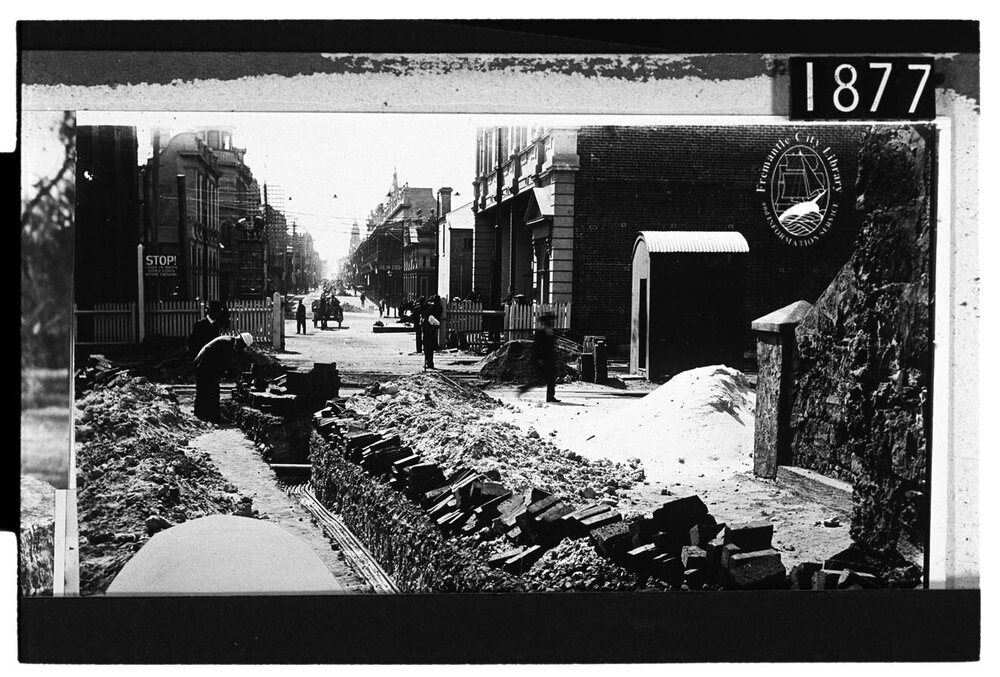 Laying cables from Power House, South Mole, through the tunnel to the Tramways Carbarn