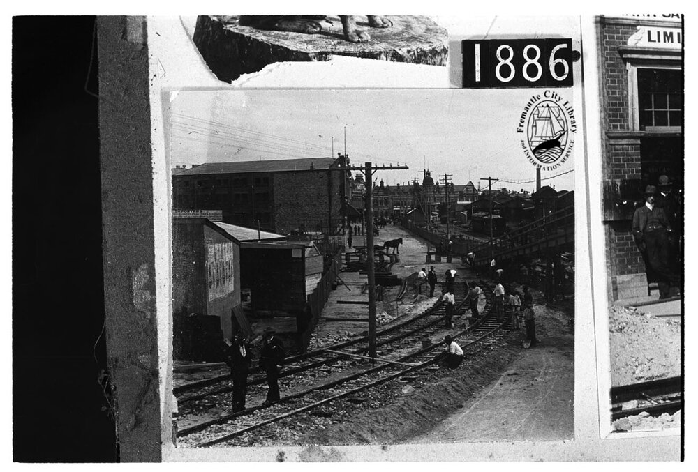 Phillimore Street looking west, laying the tramlines