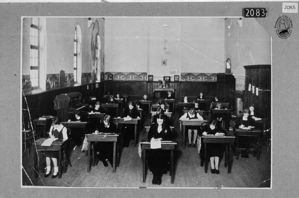 Miss Scott supervising exams