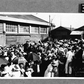 Crowd scene near Fremantle wharf sheds C and D before they were rebuilt