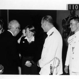 Consul General Higaki and Captain Nei meeting a John Curtin High School pupil