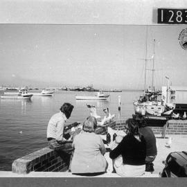 Eating fish and chips by Cicerello's Fishmarkets