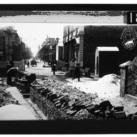 Laying cables from Power House, South Mole, through the tunnel to the Tramways Carbarn