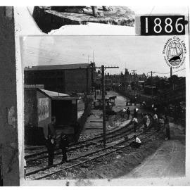 Phillimore Street looking west, laying the tramlines