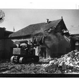 Demolition of stone cottages