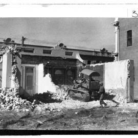 Demolition of stone cottages