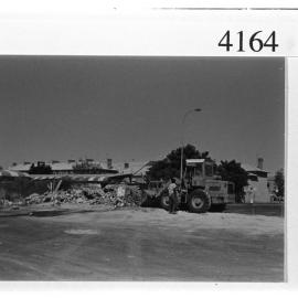 Clearing the rubble of the old turnstiles at Fremantle Oval