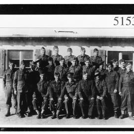 Private Ernest Forsyth in a group photograph of prisoners of war in Germany during the Second World War.