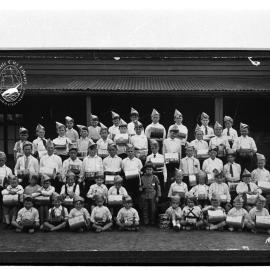 A group of small children with musical instruments.
