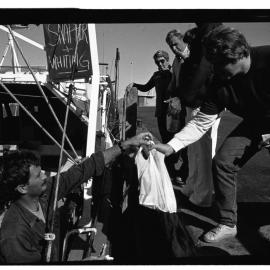 Buying fish from a fisherman at Fishing Boat Harbour