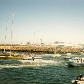 Kookaburra Yachts leaving Fishing Boat Harbour escorted by spectator boats.